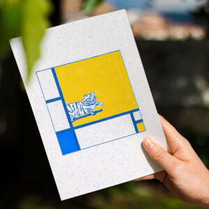 Illustration with a cat recreating "Composition with Red, Blue and Yellow" by Sara Felgueiras.