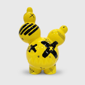 black and yellow ceramic creature by ricardo milne