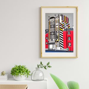 Framed drawing by Marta Duarte hung on a wall.