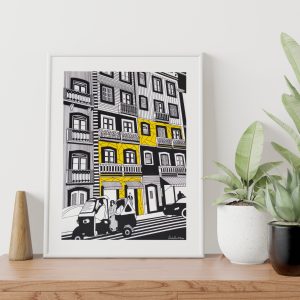 Framed drawing by Marta Duarte hung on a wall.