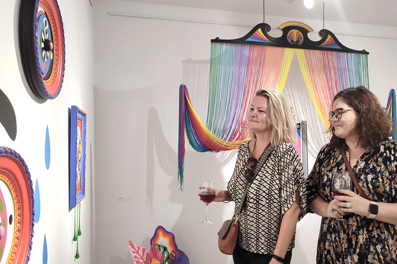 Visitants on an art show opening at apaixonarte gallery