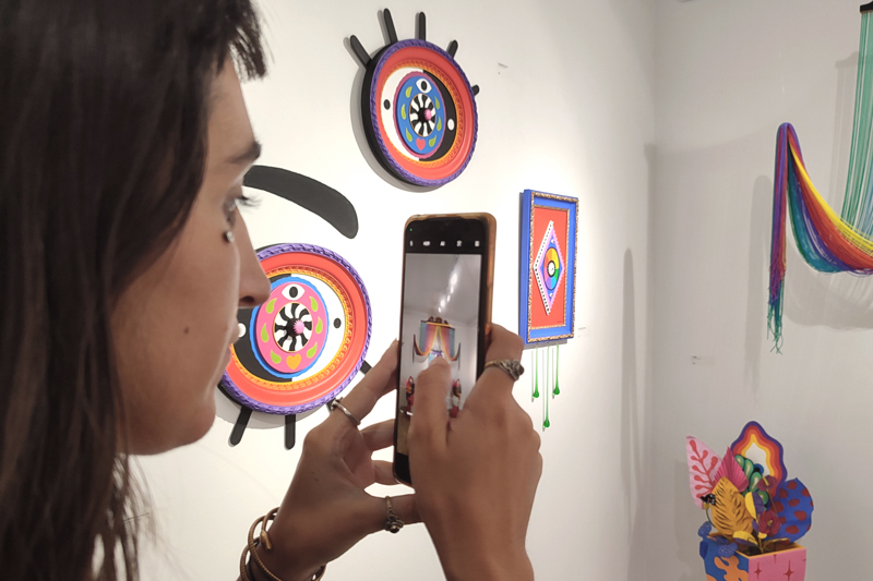 Visitants on an art show opening at apaixonarte gallery